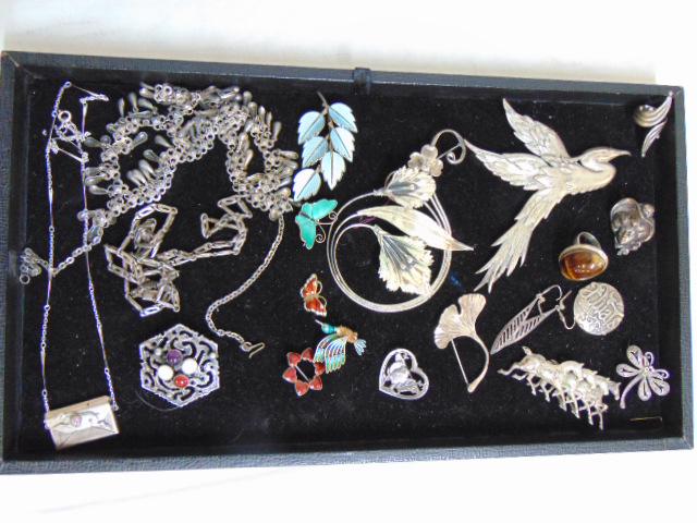 Lot of Sterling Jewelry to include large Danecraft: Lot of Sterling Jewelry to include large Danecraft Crane pin; Tiger eyes ring; Gibson girl Victorian pin; Denmark enamel pcs; envelope locket Rabbit, & more. Please see photos.
