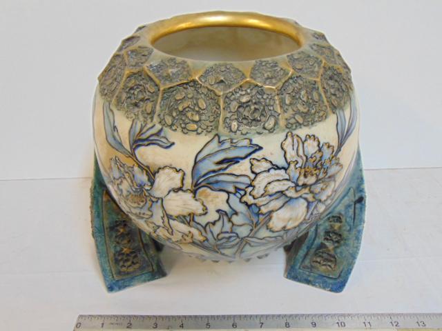 Teplitz Amphora bowl on footed base, unusual design: Teplitz Amphora bowl on footed base, unusual design round bowl with two double legs on each side, decorated in blue on ivory with floral patterns, gilt detail, height is 10.25", width is 10.75", in go