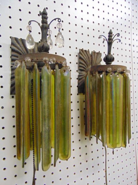 Pair Tiffany style wall sconces, pair iron wall sconces: Pair Tiffany style wall sconces, pair iron wall sconces with Tiffany style glass / crystals, one sconce has 12 crystals, other has 13, height is 13".No makers marks, sconces are as found, need cleanin