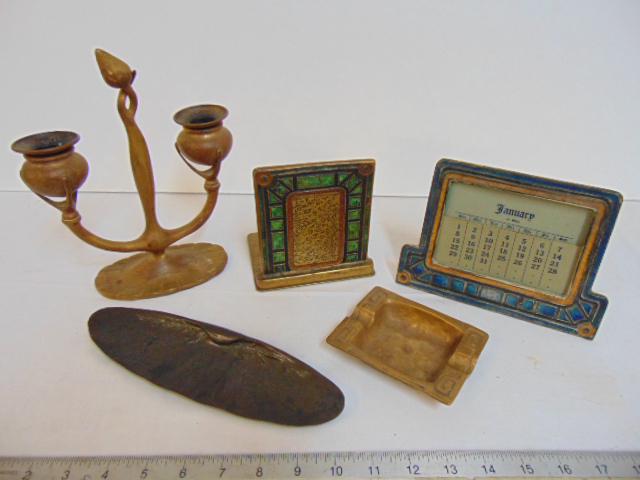Tiffany Furnaces enamel bronze calendar & Tiffany: Tiffany Furnaces enamel bronze calendar & Tiffany Furnaces single bookend, Tiffany Studios pen tray, Tiffany studios bronze double candlestick, & Tiffany Studio's ashtray