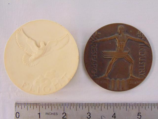 2 medallions, carved stone & bronze, Emil Zettler: 2 medallions, carved stone & bronze, Emil Zettler "Century of Progress 1933" bronze medallion & carved stone paperweight " Flight" by Prof. Giuseppe Bessi.