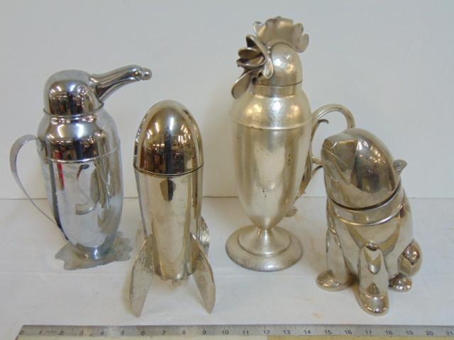Lot 4 vintage cocktail shakers, space age rocket: Lot 4 vintage cocktail shakers, space age rocket shaker, 11" tall, Penguin shaped shaker, 11.75" tall, Rooster shaker in hammered aluminum, 14" tall & Bear shaker, 10" tall.
