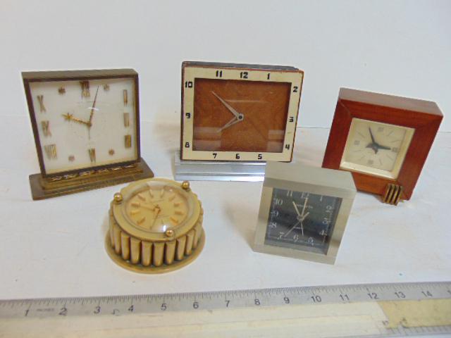 5 deco clocks, Waltham wood case clock on chrome base,: 5 deco clocks, Waltham wood case clock on chrome base, Seth Thomas "Delpar.."; brass case Seth Thomas alarm clock; Spritzer & Fuhrmann French made brass alarm clock & Tiffany & Co Swiss made steel cas