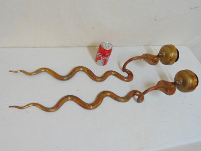 Pair Indian brass Cobra wall sconces, candle, with red: Pair Indian brass Cobra wall sconces, candle, with red painted detail, each sconce is 31.75" tall.