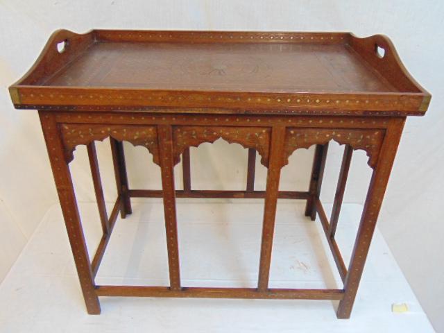 Rosewood inlaid tray table, Persian, 27 75" tall., on: Rosewood inlaid tray table, Persian, 27 75" tall., on folding base, intricate inlaid detail in copper & brass, top is 30" by 20", height is