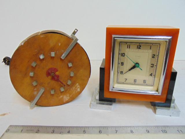 2 Art Deco clocks, round wood & Bond Bakelite & chrome,: 2 deco clocks, round wood & Bond Bakelite & chrome, round wood clock with metal detail, veneer loose on sides & square art deco electric clock by Bond.