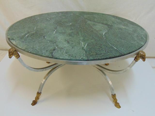 Steel & brass base marble top table, brass hoof feet &: Steel & brass base marble top table, brass hoof feet & rams heads, round steel base, green marble, table is 31.5" in diameter, height is 15"