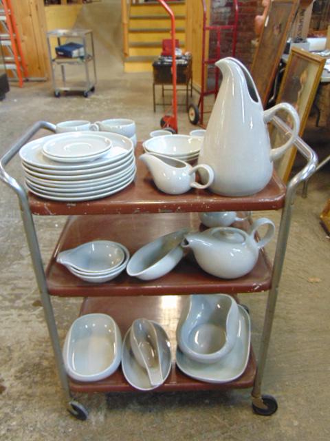 Set Russel Wright dinnerware, in grey, includes: Set Russel Wright dinnerware, in grey, includes pitcher, 8 dinner plates, teapot, sugar & creamer, gravy boat, two bowls, one with under plate, 5 small (soup) bowls & one slightly smaller one, salt pe