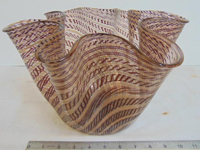 Handkerchief art glass vase, with decorative designs in: Handkerchief art glass vase, with decorative designs in brown & gilt, vase is 12" to 13" wide, height is 7.5", in good condition.