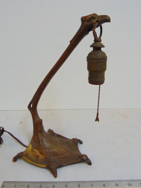 Loetz lamp base, bird of prey themed with claw tray: Loetz lamp base, bird of prey themed with claw tray base & head, no shade, lamp base is 12 7/8" tall.
