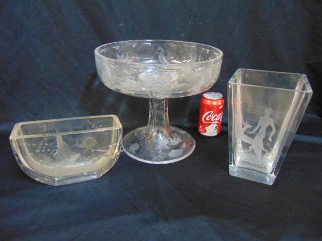 Glass lot, Orrefors, William Yeoward, includes large: Glass lot, Orrefors, William Yeoward, includes large bowl on stand with etched sea creatures by William Yeoward, top is 11.75", height is 10" has chip on base; Orrefors square vase with etched woman &