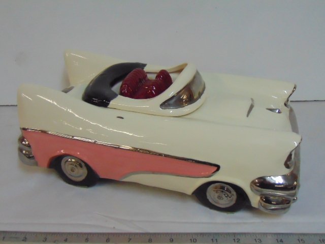 Classic car cookie jar, "Appleman 19881, pink & white: Classic car cookie jar, "Appleman 1981, pink & white car, 1950's style, 15.5" long, 9" wide.