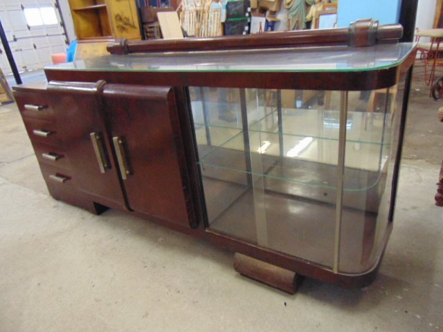 Art deco server, cabinet, sliding glass doors, drawers: Art deco server, cabinet, sliding glass doors, drawers & cabinet, curved glass side, cabinet is 88.5" by 19", height is 42.5", top finish worn, cabinet needs restoration.