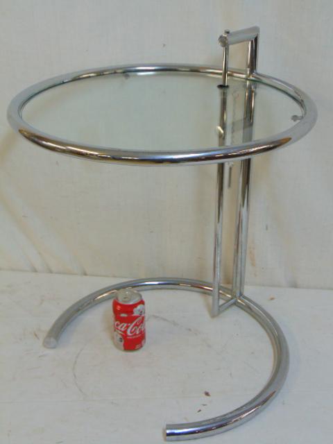 Eileen Gray adjustable chrome & glass table, tubular: Eileen Gray adjustable chrome & glass table, tubular round construction side table with adjustable height, table is 20" in diameter, height 24.5" (lowest position)