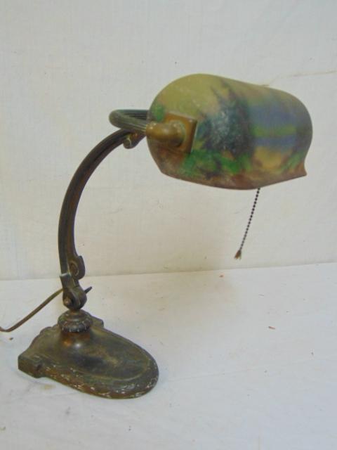 Piano lamp with reverse painted shade, possibly Handel,: Piano lamp with reverse painted shade, possibly Handel, with oak leaf trim on base, lamp is 14" tall, shade is 8.25" wide, decorated with landscape, shade good, no cracks, chips/
