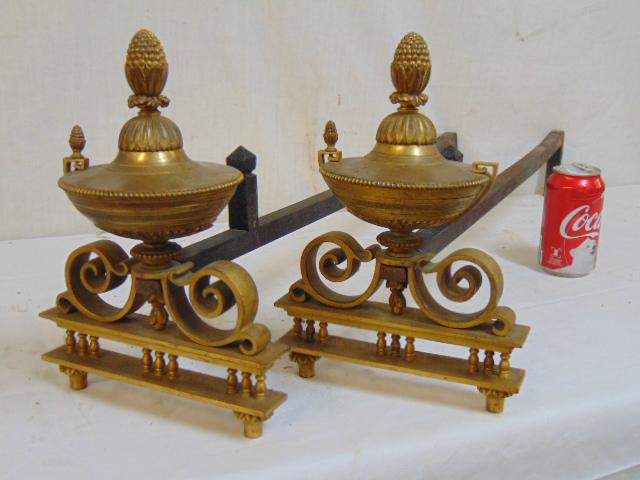 Pair brass & iron andirons, urn design, unusually deep,: Pair brass & iron andirons, urn design, unusually deep, each urn has one handle missing, depth is 30"