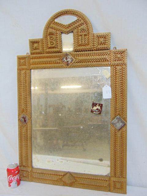 Gilt wood Tramp Art frame, mirror, with decorative: Gilt wood Tramp Art frame, mirror, with decorative diamond glass decoration, mirror is 37.5" by 23.75", initials "B T" in top, two glass diamonds are loose.