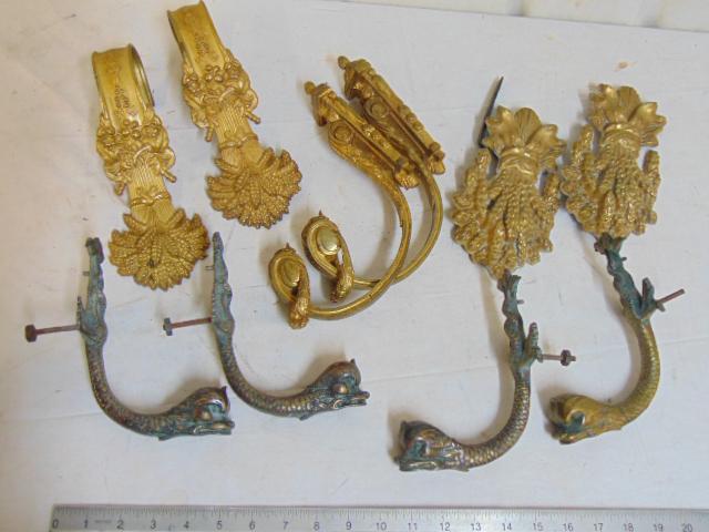 Lot brass, bronze tie backs, 3 pair tie backs & 4: Lot brass, bronze tie backs, 3 pair tie backs & 4 bronze dolphin garnitures, feet.