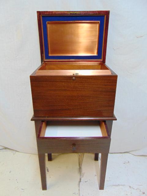 Alfred Dunhill humidor on stand, mahogany case with: Alfred Dunhill humidor on stand, mahogany case with brass lined interior, base has milk glass lined drawer, 18.25" by 13.25", height (on base, as shown) is 36.5".UPDATE, received multiple inquiries re