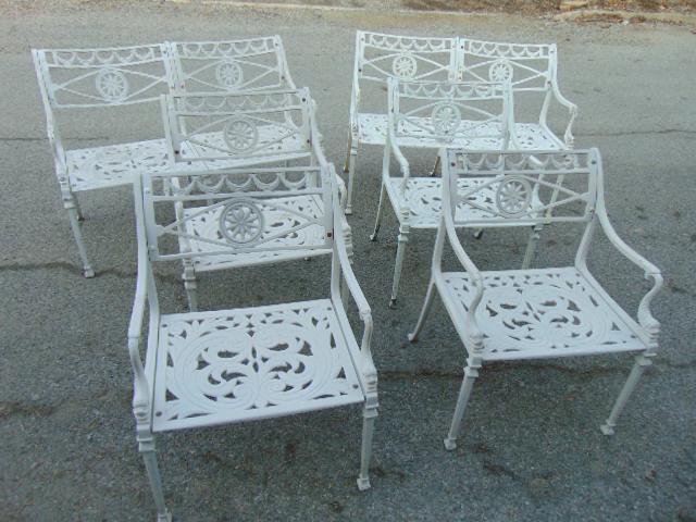 6 piece cast aluminum patio set, Molla Inc.: 6 piece cast aluminum patio set, 2 loveseat & 4 armchairs, decorated with dolphins, each bench is 43" wide, 24" deep, height is 31", chairs are 23" wide, 20" deep, 30.5" tall.Update, the original list