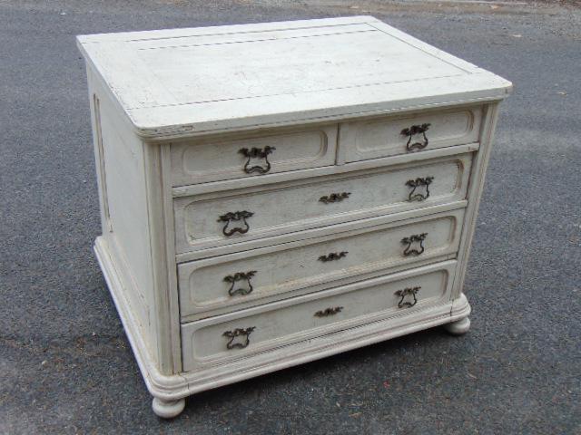 Antique 2 over 3 chest of drawers in white paint: Antique 2 over 3 chest of drawers in white paint, brass hardware, chest is extra deep, donut feet in front , cabinet is 41.25" wide, 32" deep, height is 34"