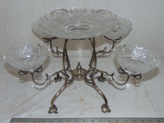 Silver plate "Petit fours" serving piece, Epergne: Silver plate Petit fours or Epergne serving piece, 4 arms with center bowl, hallmarked silver plate frame with glass bowls, 9.5" tall, 16.5" wide (silver-plate only), glass in good condition.