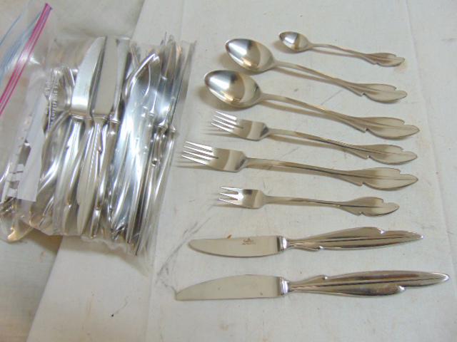 Paul Wunderlich for Rosenthal Stainless flatware set,: Paul Wunderlich for Rosenthal Stainless flatware set, "Fabula",service for 12, stainless steel, 18/8, includes large & small knife, large & small spoon, tea spoon & large & small fork, cocktail fork, 