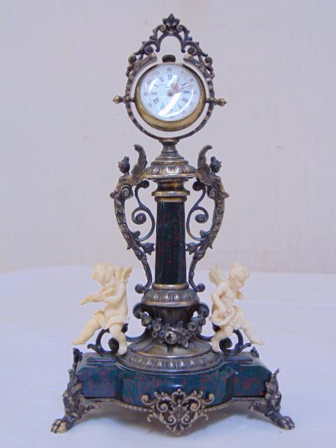 Bartens & Rice Co New York Jasper Putti clock,: Bartens & Rice Co New York Jasper Putti clock, hallmarks ,note, right putti has part of arm, instrument missing, this can clearly be seen in the images, please look at image 2.
