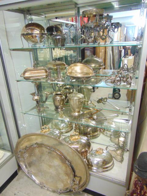 Large lot silver-plate, mostly 19th Century, including: Large lot silver-plate, mostly 19th Century, including huge over serving plate, various domes, candle holders, covered dishes, epergne, pitcher, tea pot and more, see images.