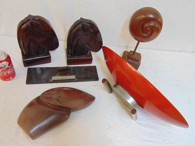 Carved wood & stone sculpture lot, includes two horse: Carved wood & stone sculpture lot, includes two horse head bookends, carved stone figure (chip on bottom edge), oval wood bowl on alu deco style base, red painted exterior, rosewood frame holder & car