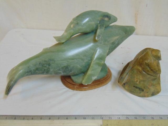 Carved stone whale & sculpture, carved green soapstone: Carved stone whale & sculpture, carved green soapstone whale carrying calf some chips signed "Alexander", Alaska & green alabaster sculpture, unsigned, whale is 19" long.