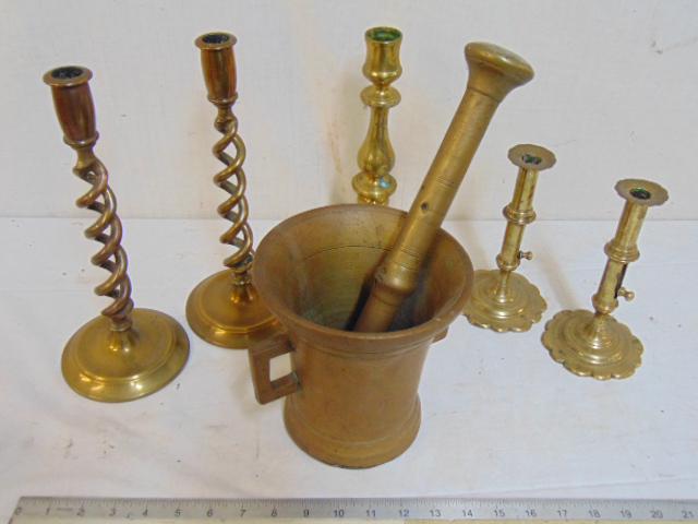 5 brass candlesticks & mortar & pestle, includes pair: 5 brass candlesticks & mortar & pestle, includes pair 7.25" push up sticks, pair of 11.5" spiral sticks, single 11" candlestick & large solid bronze mortar & pestle.