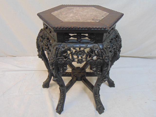 Chinese marble top plant stand, carved base, hexagon: Chinese marble top plant stand, carved base, hexagon top, stand is 16.25" wide, height is 19.5"