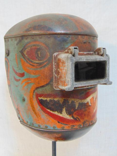 Paint decorated welders helmet, on stand, original (1 of 6)