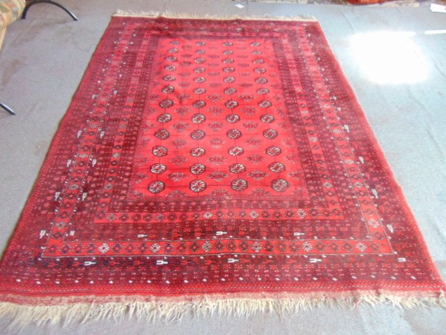 Room size Bokhara carpet, in red, rug is 9' by 6'10" (1 of 5)