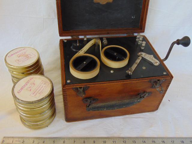 Instructograph machine with paper ribbon, wood case, (1 of 6)