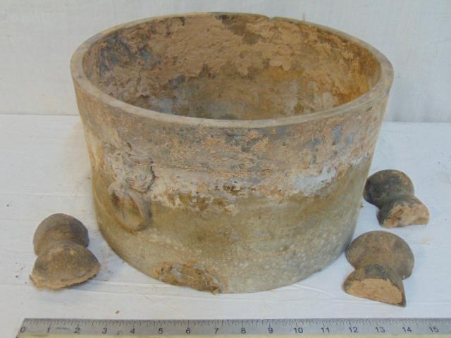 Early earthenware pot, on three (loose) feet, appears (1 of 8)