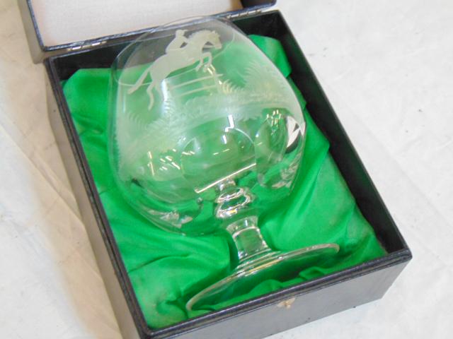 Dunhill cut crystal Cognac snifter, engraved with: Dunhill cut crystal Cognac snifter, engraved with equestrian scene, in original box.Schonwalder Kristall, West Germany