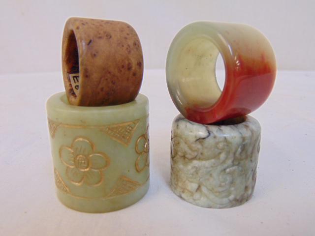 4 Chinese archer rings, carved jade, stone, one wood, (1 of 6)