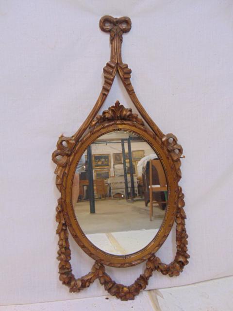 Decorative oval gilt mirror with carved ribbon (1 of 4)
