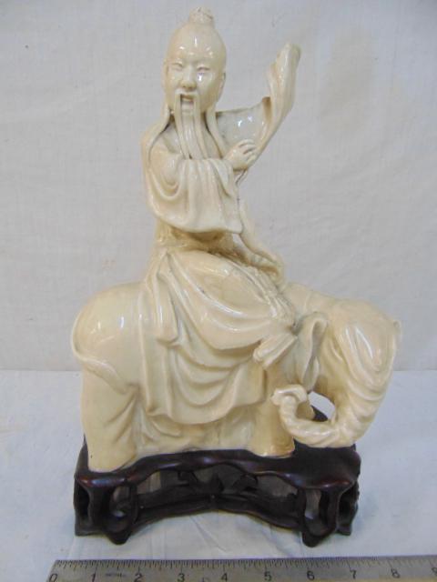 Chinese ceramic figure on elephant, on wood base, (1 of 6)
