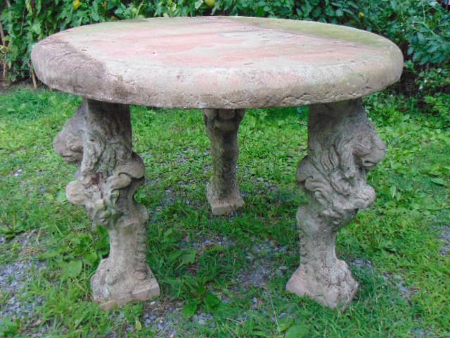 Cast stone table on 3 elephant shaped legs, table is (1 of 7)