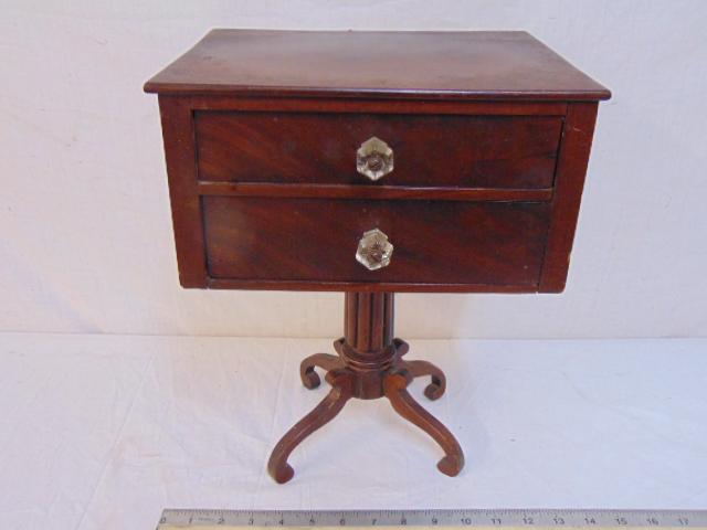 Miniature 2 drawer stand, antique, in mahogany, 11" by: Miniature 2 drawer stand, antique, in mahogany, 11" by 9", height is 14 3/8"