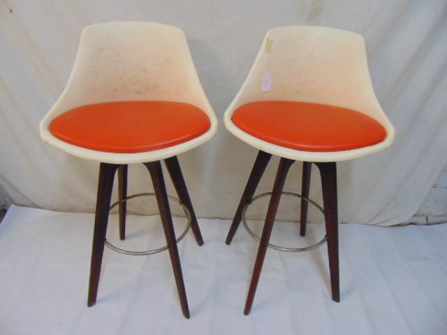 Two mid Century bar stools, vinyl, in orange & white, (1 of 5)