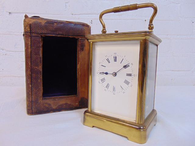 Repeater brass carriage clock in original leather (1 of 6)