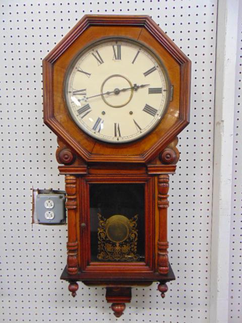Octagonal case wall clock, with gilt decorated glass (1 of 6)