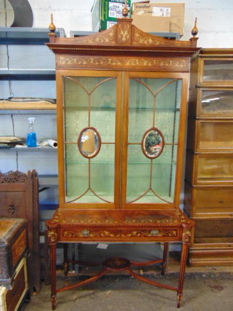 Paint decorated vitrine, inlaid mahogany, with beveled: Paint decorated vitrine, inlaid mahogany, with beveled glass inserts in doors, base nicely decorated, has drawer, cabinet is 43.25" wide, 21" deep, height is 92", top interior lined with fabric, two p