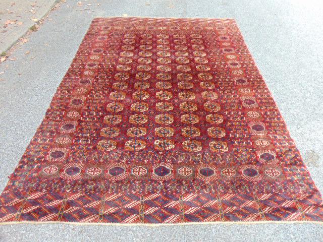 Early Bokhara carpet, in red,, rust brown, carpet is (1 of 7)
