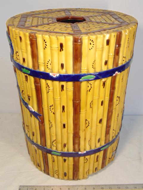 Minton Majolica "Bamboo" garden seat, ceramic glazed: Minton Majolica "Bamboo" garden seat, ceramic glazed garden seat decorated with ribbon tied stalks of bamboo, garden seat is 18.25" tall, diameter is 13.75", few small chips.