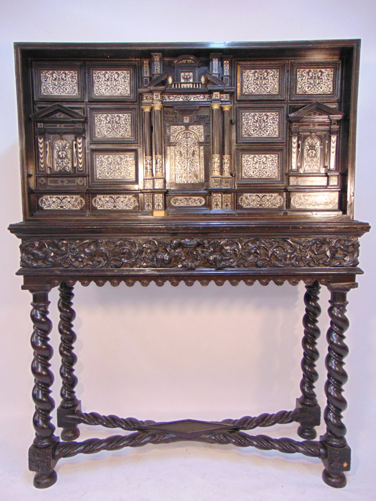 Italian ebony & rosewood, bone inlaid Vargueno cabinet: Italian ebony & rosewood, bone inlaid cabinet on base, Vargueno, looks like 19th Century (top), extensively decorated ebonized cabinet with carved & inlaid drawers, hidden & secret drawers, baroque st